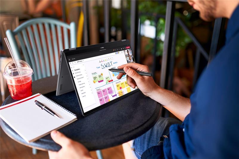 An ASUS Pen with a Vivobook Flip that is folded backwards